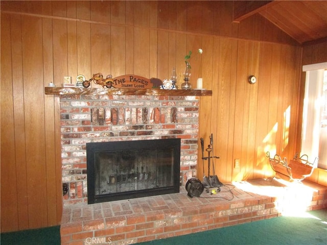 2440 Spruce Dr, Arrowbear, CA 92382 - detailed view of wood walls, a brick fireplace, and beam ceiling