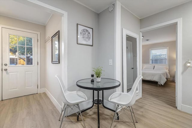 dining area featuring light wood-type flooring