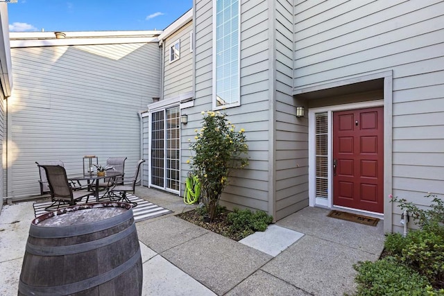 property entrance with a patio