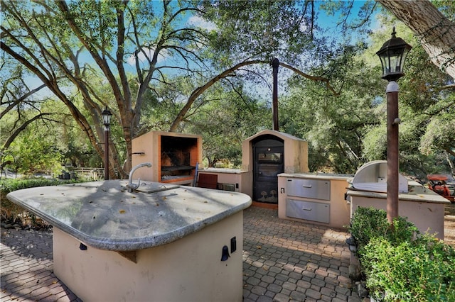 view of patio with area for grilling