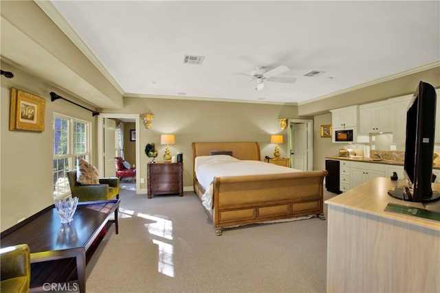 carpeted bedroom with wine cooler and ornamental molding