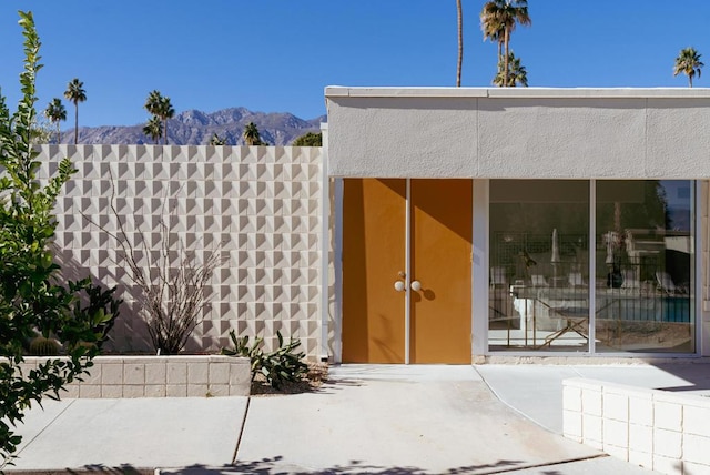 property entrance with a mountain view