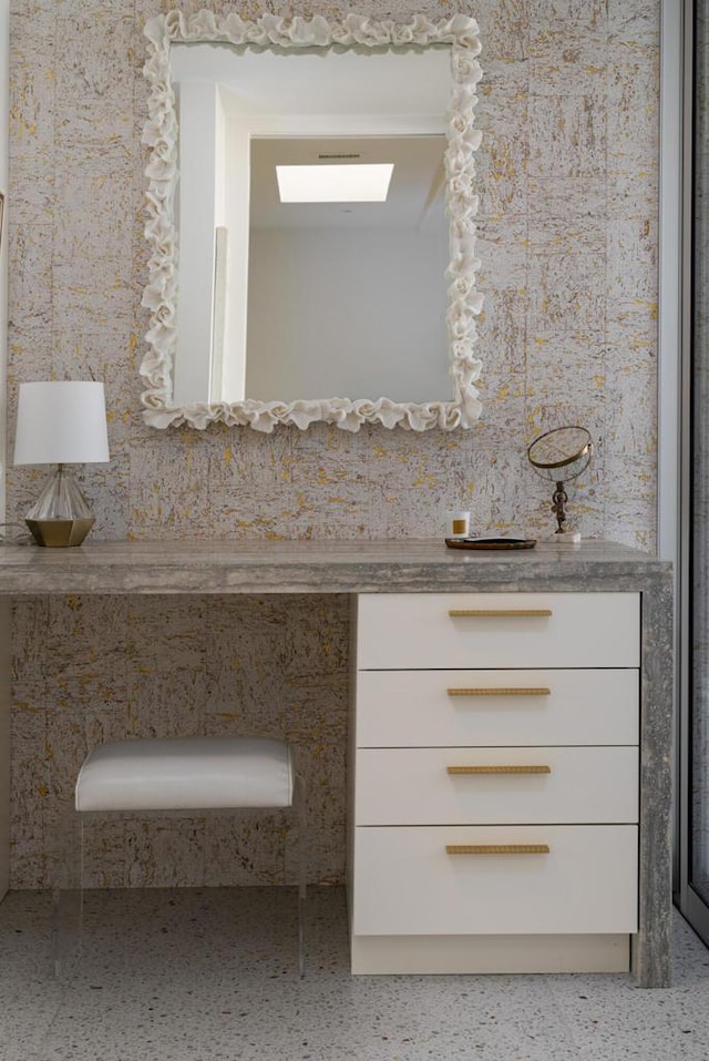 bathroom with vanity and backsplash