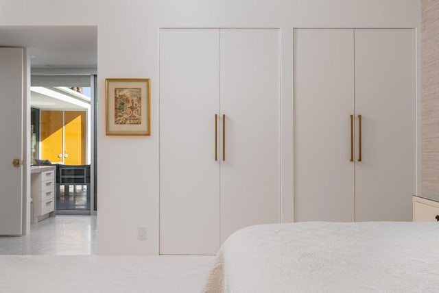 bedroom featuring two closets