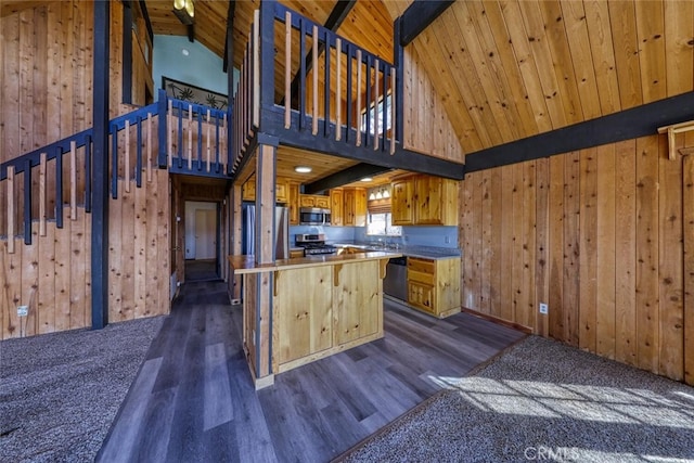 kitchen with high vaulted ceiling, dark hardwood / wood-style floors, beam ceiling, and appliances with stainless steel finishes