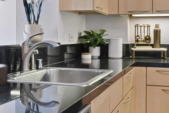 kitchen featuring sink and light brown cabinets