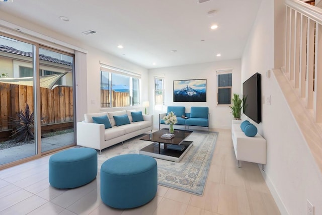 living room with light tile patterned floors