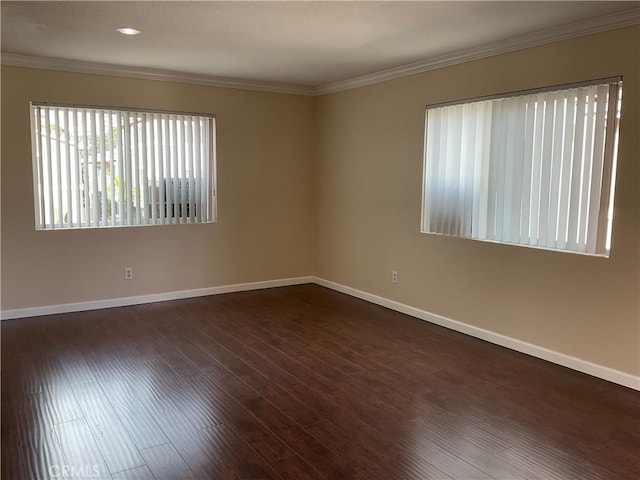7405 Charmant Dr Unit 2320, San Diego, CA 92122 - spare room with baseboards, dark wood-style flooring, and crown molding