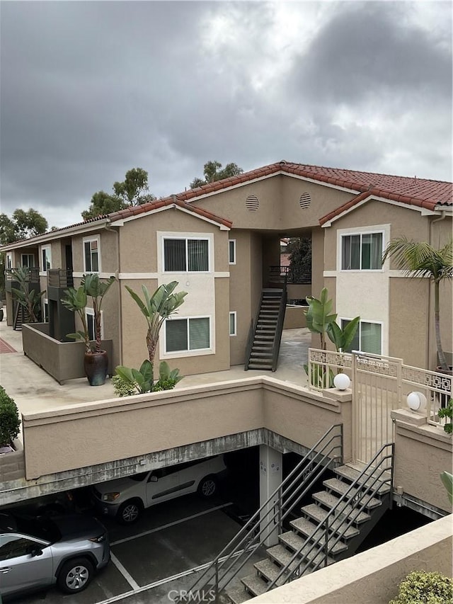7405 Charmant Dr Unit 2320, San Diego, CA 92122 - view of building exterior with stairs