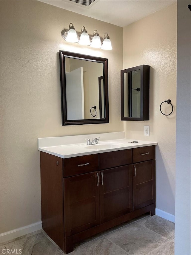 7405 Charmant Dr Unit 2320, San Diego, CA 92122 - bathroom featuring vanity and baseboards