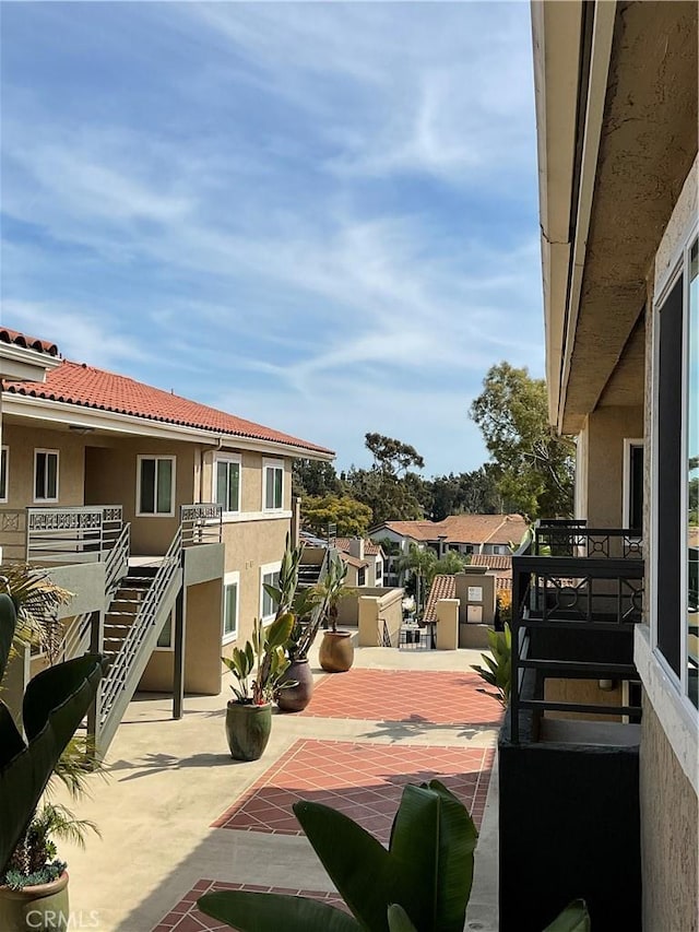 7405 Charmant Dr Unit 2320, San Diego, CA 92122 - view of patio with a residential view and stairway