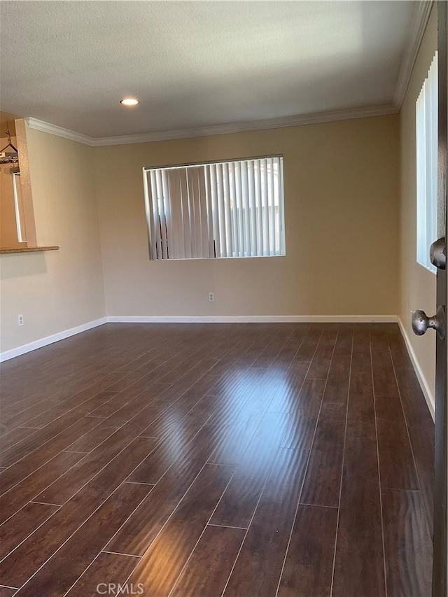 7405 Charmant Dr Unit 2320, San Diego, CA 92122 - unfurnished room with ornamental molding, dark wood-type flooring, and a textured ceiling