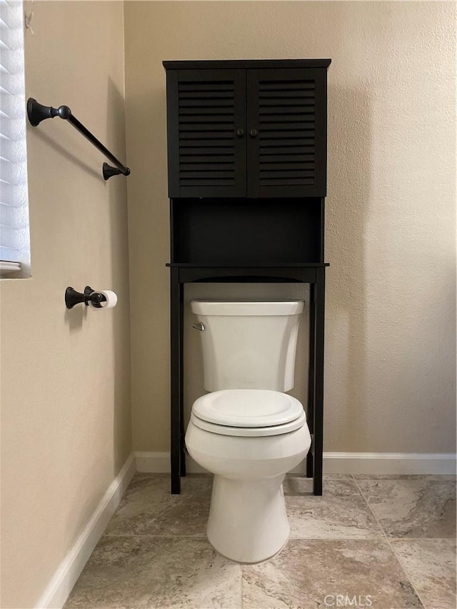 7405 Charmant Dr Unit 2320, San Diego, CA 92122 - bathroom featuring toilet and baseboards