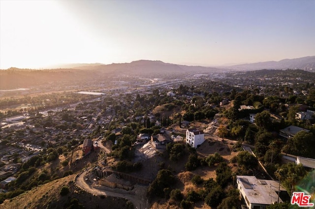 aerial view at dusk with a mountain view