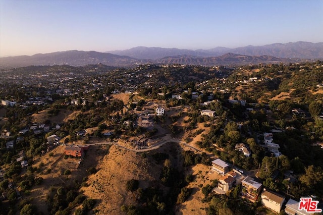 aerial view at dusk with a mountain view