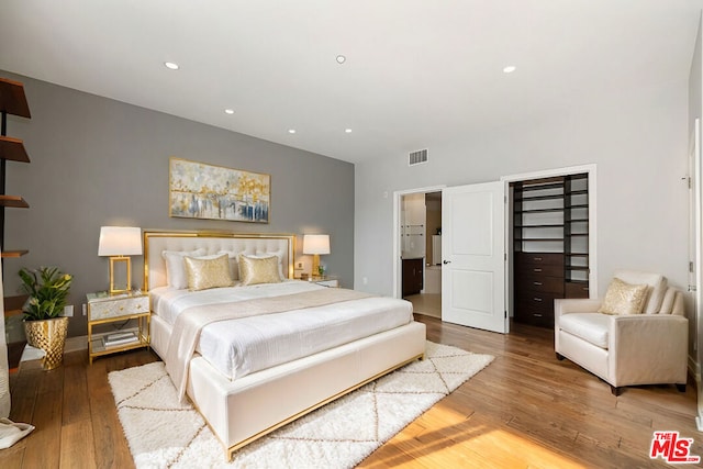 bedroom featuring wood-type flooring