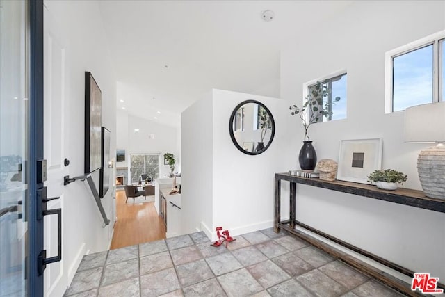 foyer entrance with vaulted ceiling