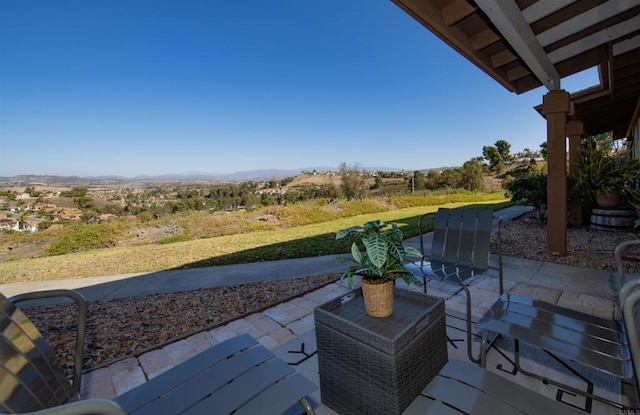 view of patio featuring a mountain view