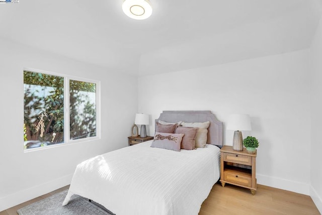 bedroom featuring light wood-type flooring