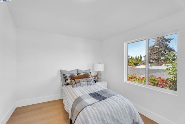 bedroom featuring light wood-type flooring