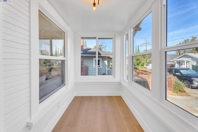 unfurnished sunroom featuring a healthy amount of sunlight