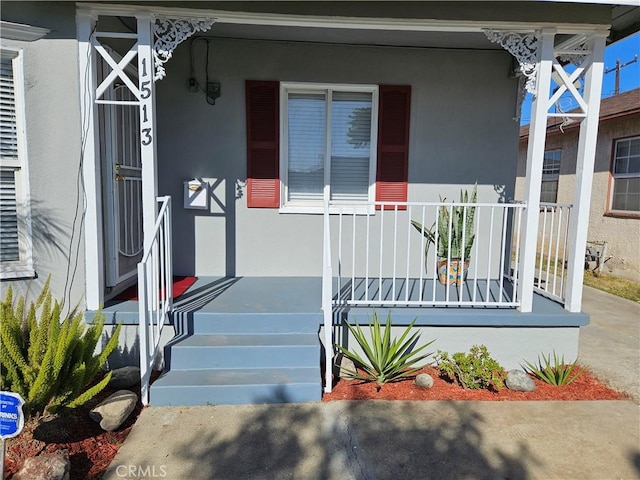 entrance to property with covered porch