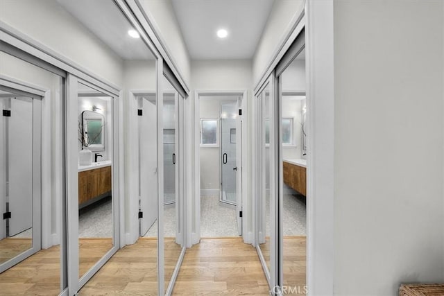 hallway featuring light wood-type flooring