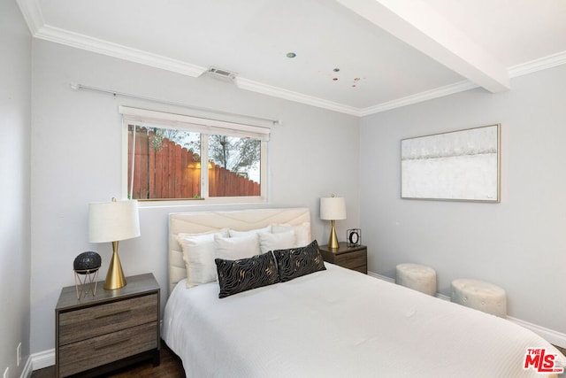 bedroom featuring dark hardwood / wood-style flooring, crown molding, and beamed ceiling