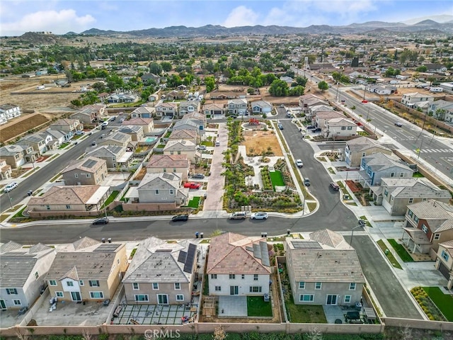 drone / aerial view featuring a mountain view