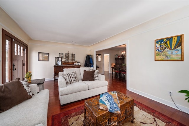 living room with dark hardwood / wood-style flooring