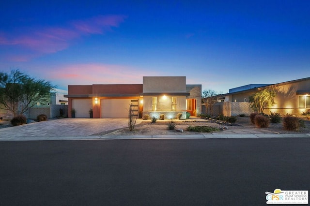 view of front of property featuring a garage