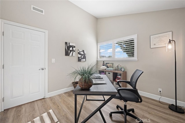 office space featuring light wood-type flooring