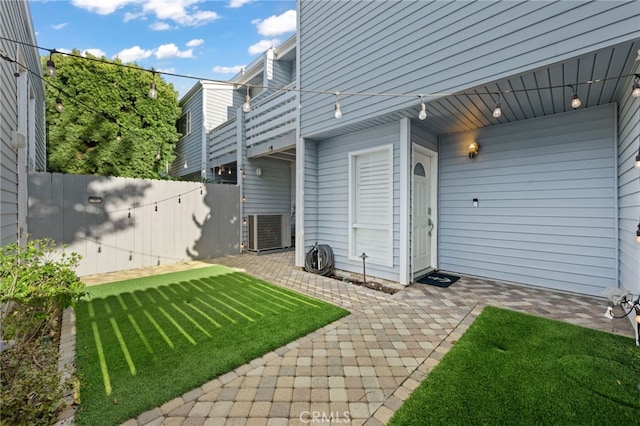 view of yard featuring central air condition unit