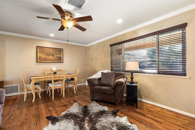 interior space featuring crown molding and dark hardwood / wood-style flooring