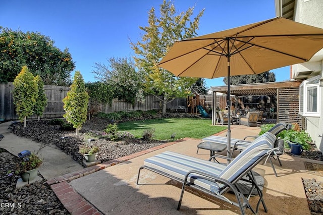 view of patio with a playground