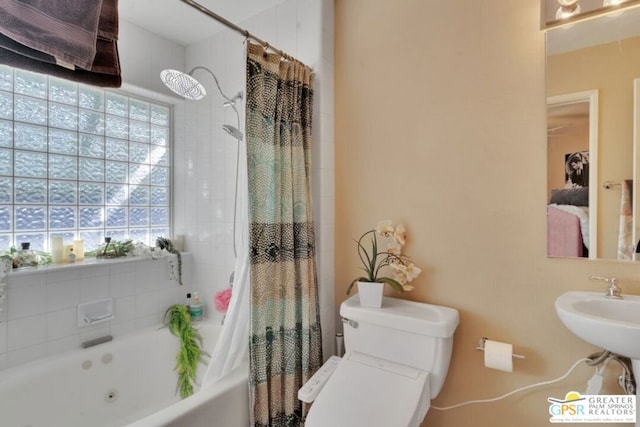 bathroom featuring toilet and shower / bath combo