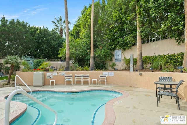 view of pool with a patio