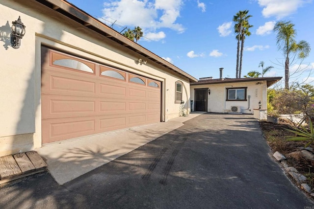 ranch-style home with a garage