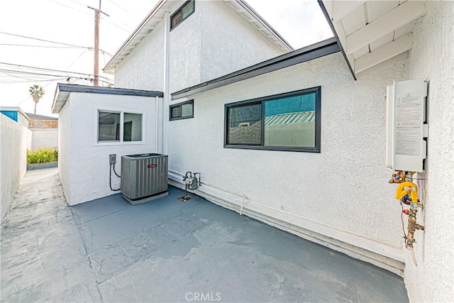 exterior space featuring a patio and central air condition unit