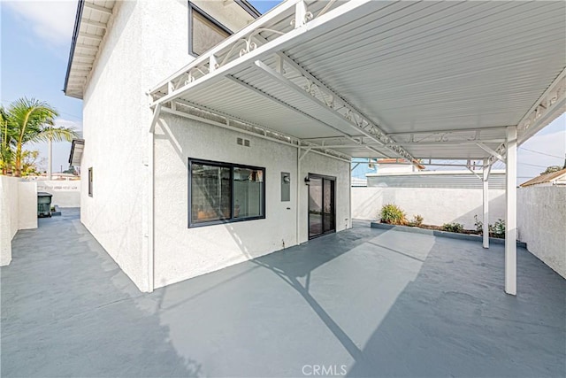 view of patio / terrace featuring electric panel
