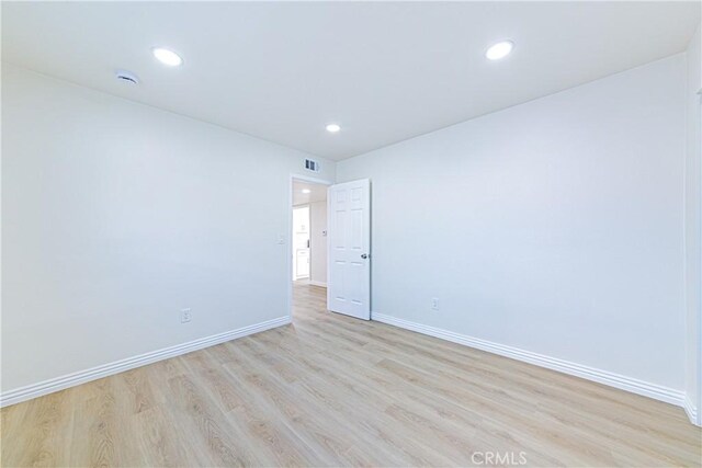 empty room featuring light hardwood / wood-style flooring