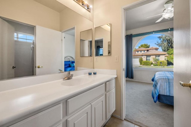 bathroom with vanity and ceiling fan