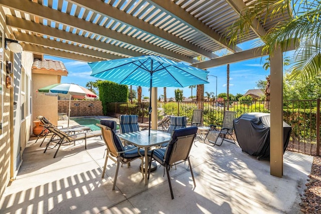 view of patio / terrace with a fenced in pool, a grill, and a pergola