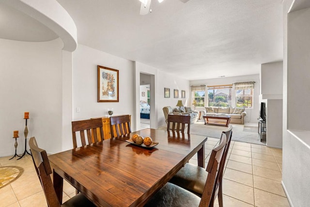 dining space with light tile patterned flooring