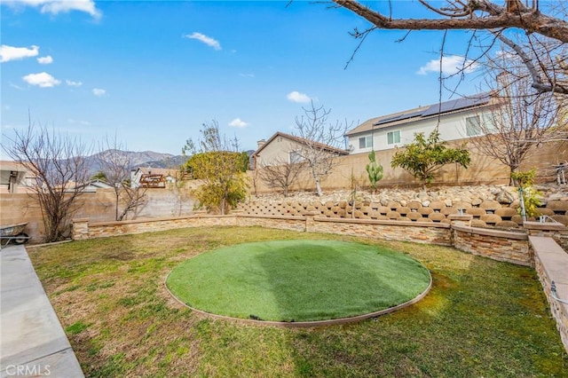 view of yard with a mountain view