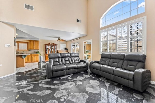 living room with ceiling fan