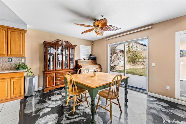 dining space featuring ceiling fan