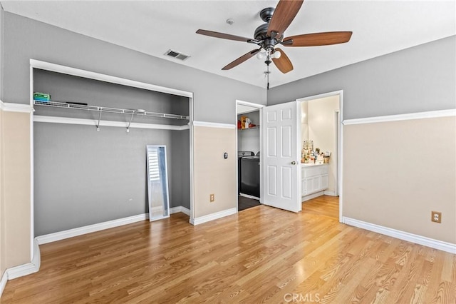 unfurnished bedroom featuring light hardwood / wood-style flooring, a closet, and ceiling fan