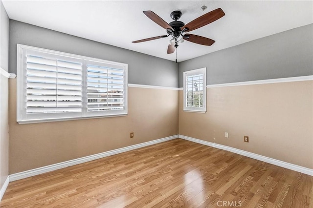 unfurnished room featuring ceiling fan and light wood-type flooring