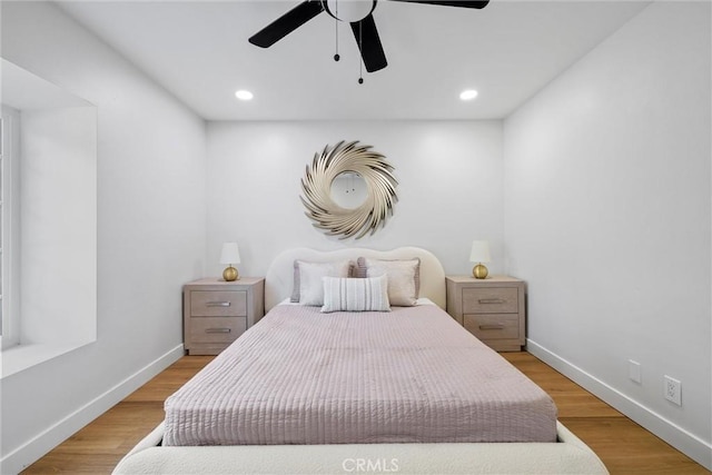 bedroom featuring ceiling fan and light wood-type flooring